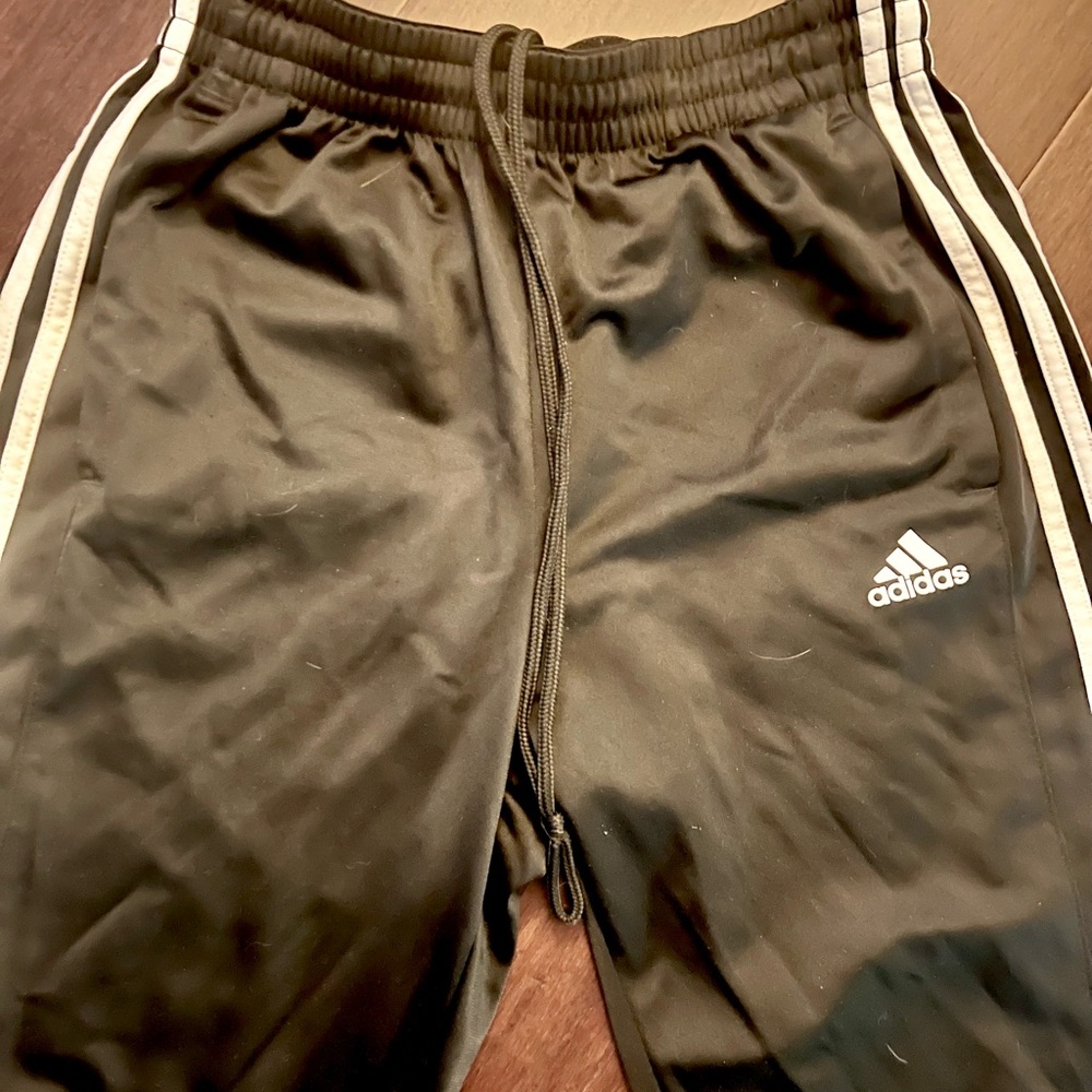 Adidas Kids Black Joggers with White Stripes. Zip back pocket. Smoke free home
